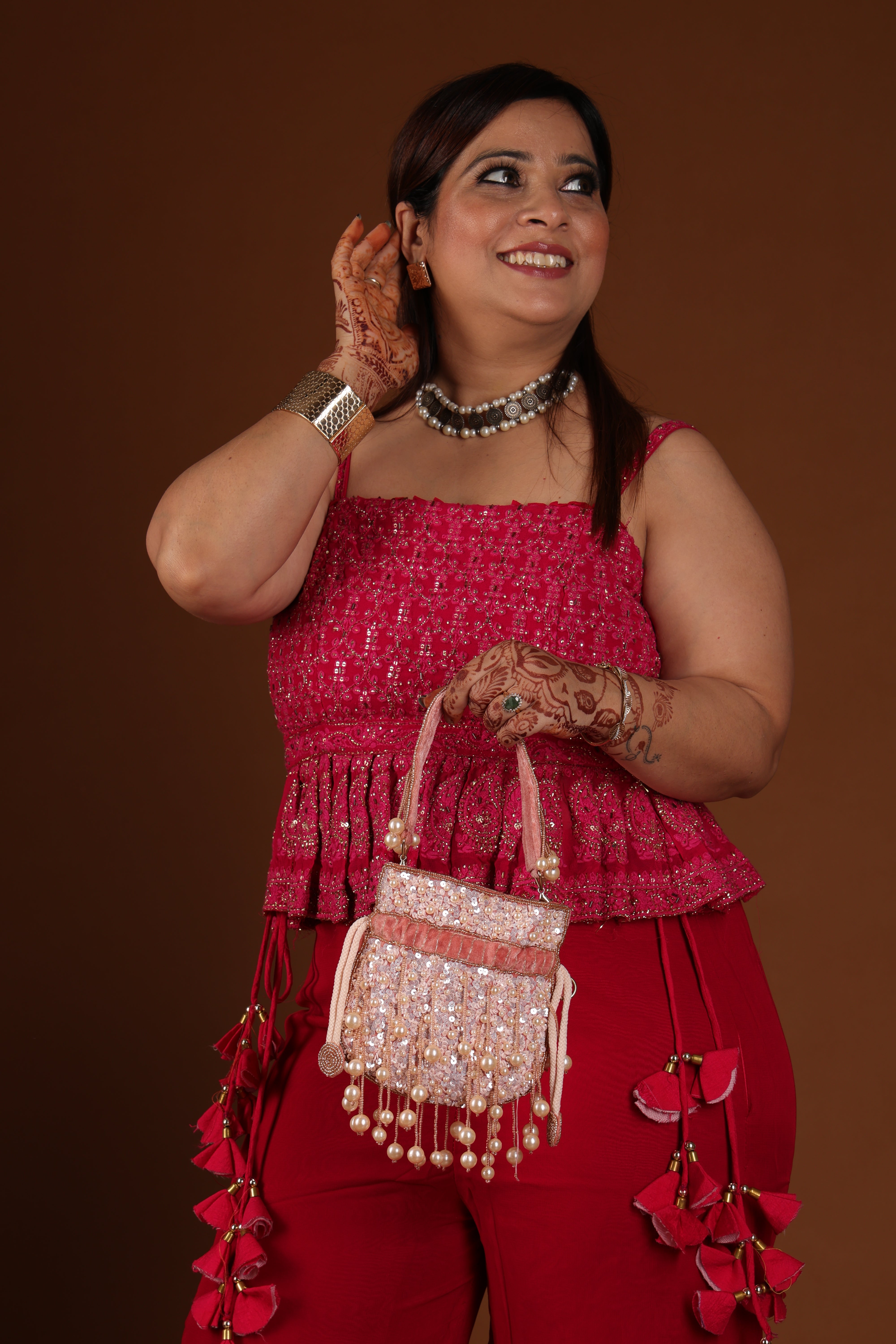 Rose Oyester Embellished Potli